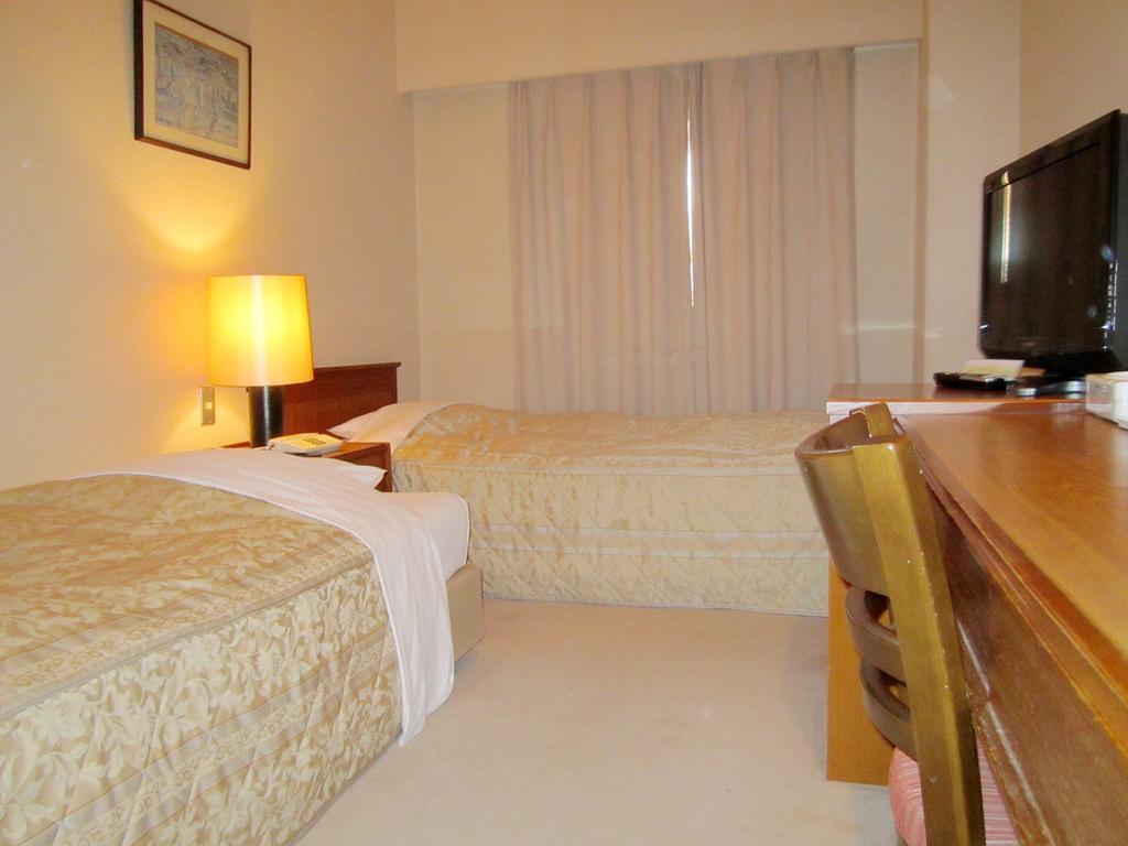 Hotel Pearl City Kurosaki Kitakyushu Bagian luar foto