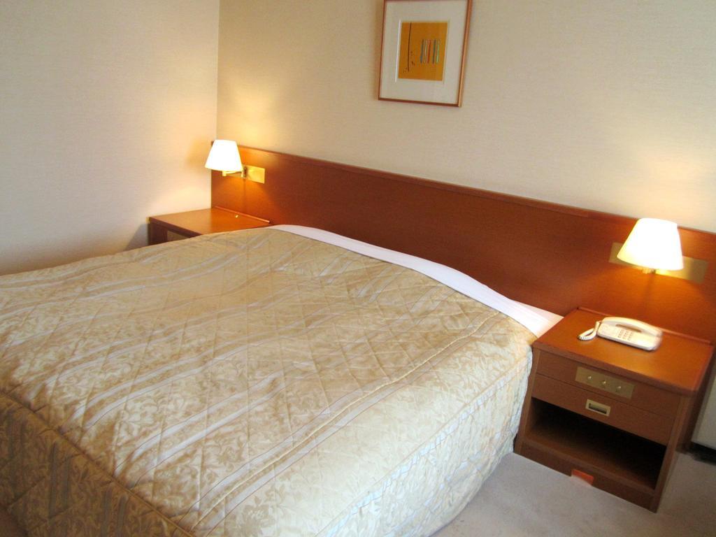 Hotel Pearl City Kurosaki Kitakyushu Bagian luar foto