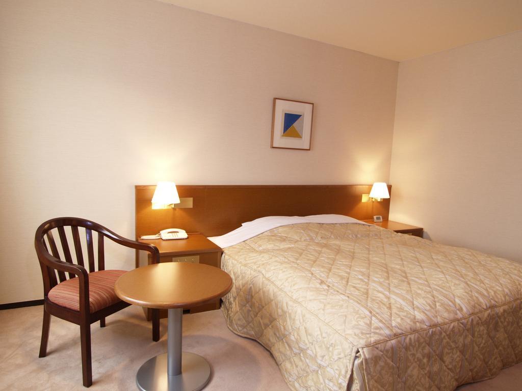 Hotel Pearl City Kurosaki Kitakyushu Bagian luar foto